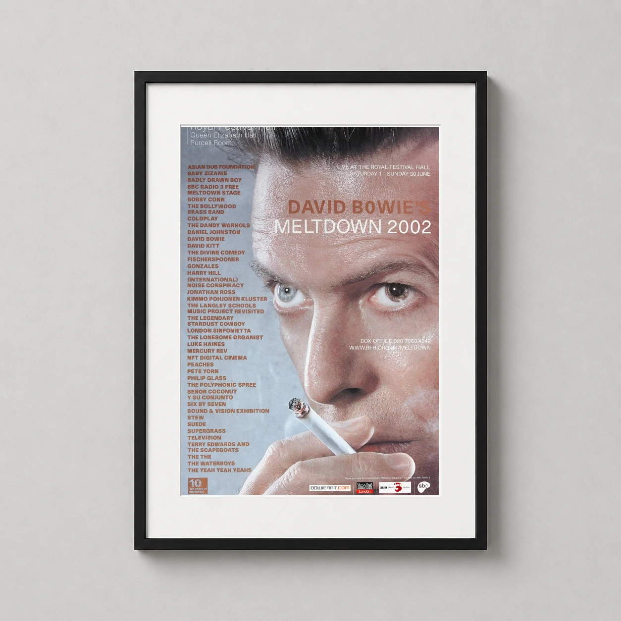 Room mockup of David Bowie Meltdown Festival 2002 Royal Festival Hall Photography Print, displayed as framed wall art in a dorm room setting as a portrait print.