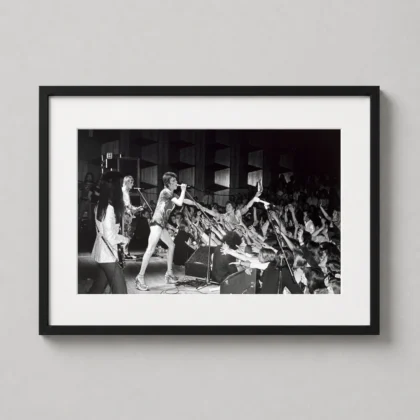 David Bowie crowd performance print showing a black and white live scene with Bowie reaching toward an excited audience as