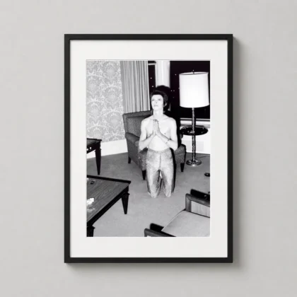 David Bowie hotel prayer print showing a black and white hotel-room image with Bowie kneeling, hands together, and a
