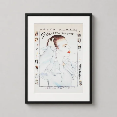 A framed David Bowie glamour art print displayed on a bedroom wall beside a collection of vinyl records.