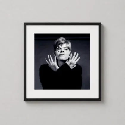 David Bowie Aladdin hands print showing a black and white portrait with Aladdin-style face paint and both hands raised near