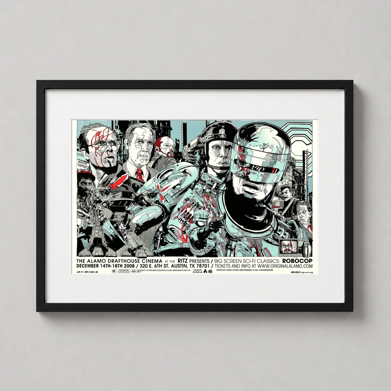Room mockup of RoboCop Tyler Stout Mondo Sci-Fi Dystopian Movie Poster, displayed as framed wall art in a home theater setting as a landscape print with blue, teal, and red tones.