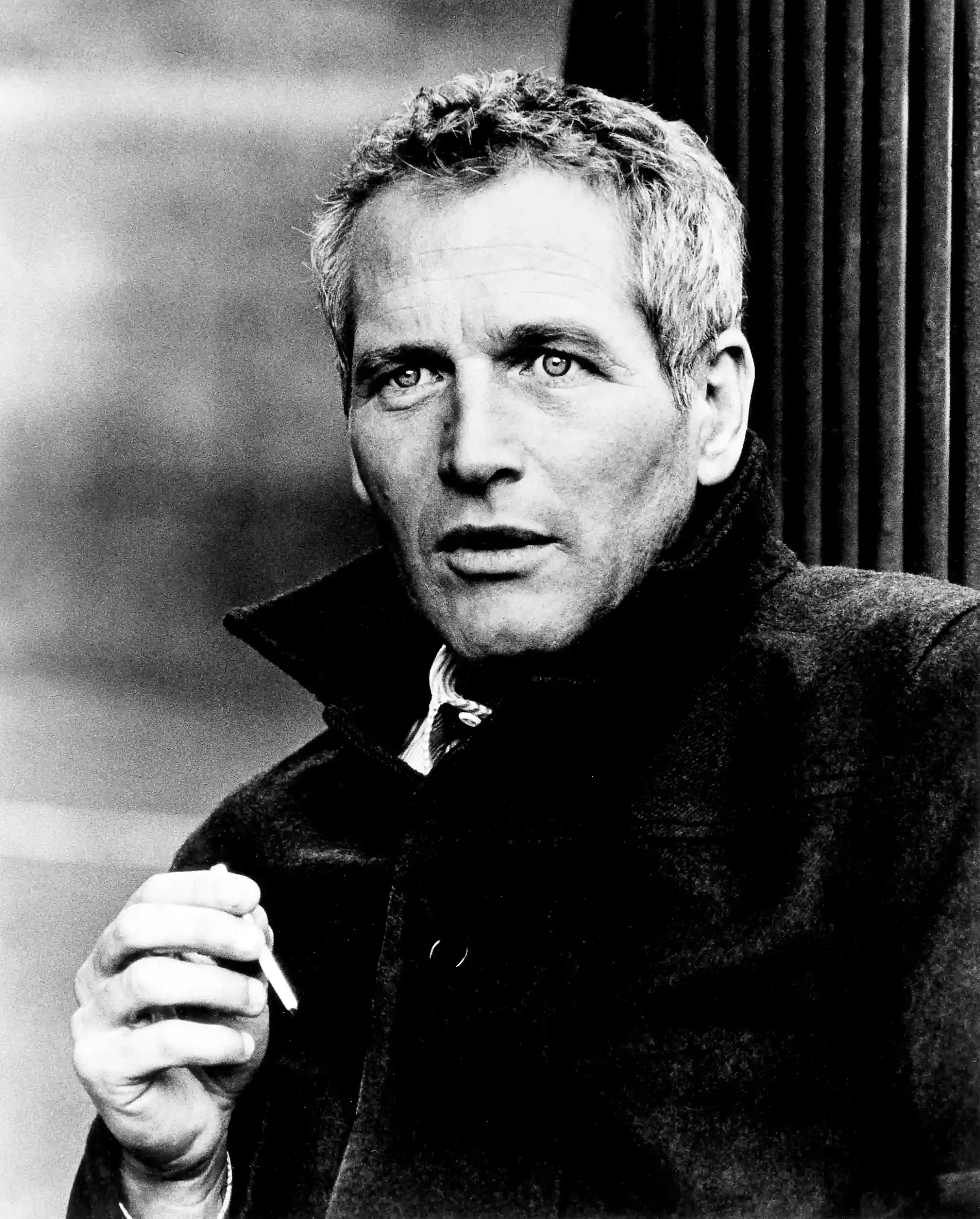Paul Newman England 1973 — 1973 England portrait shows Paul Newman in a dark coat with cigarette