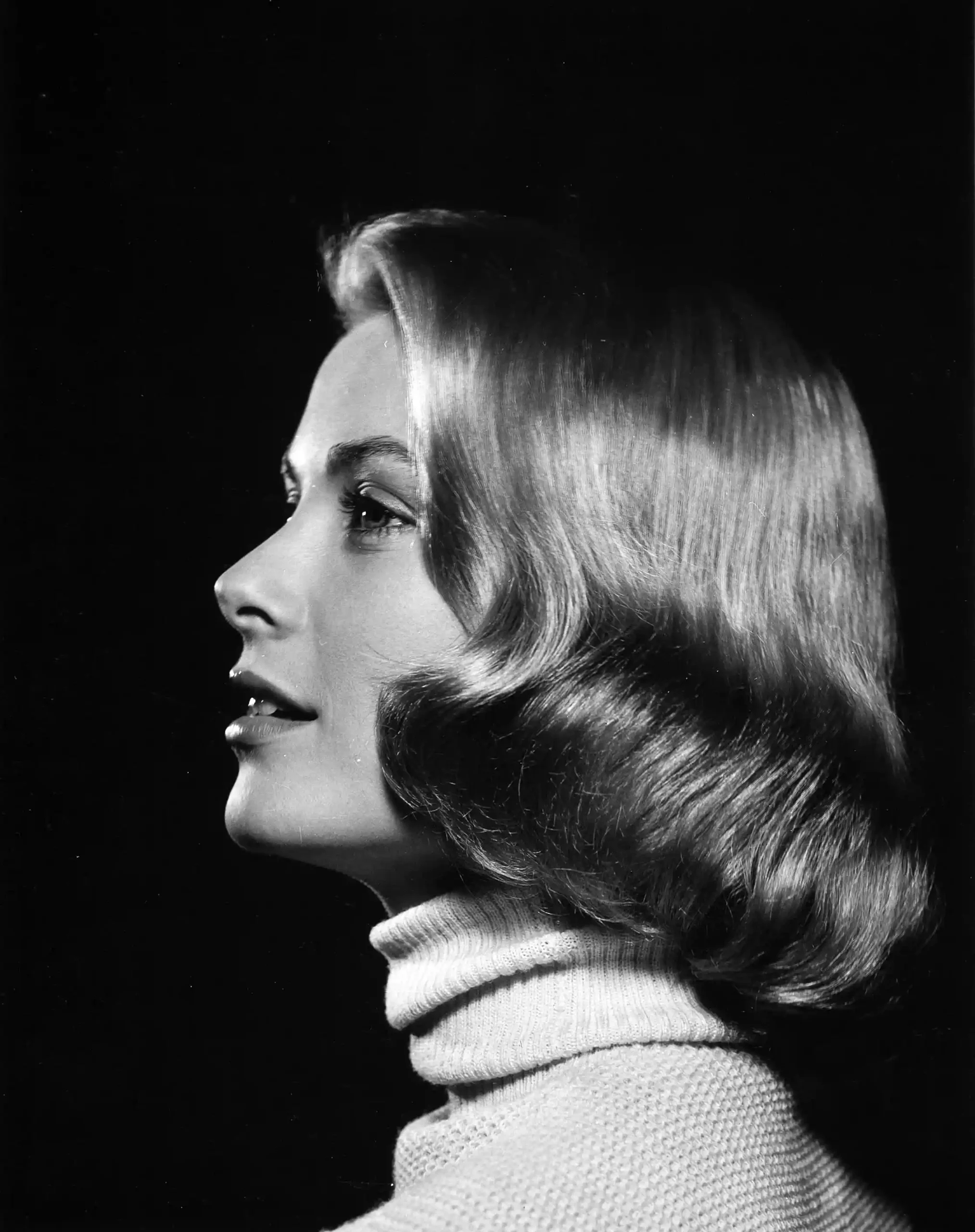 Grace Kelly profile poster showing a 1953 LIFE side-view portrait with glossy hair and knit collar.