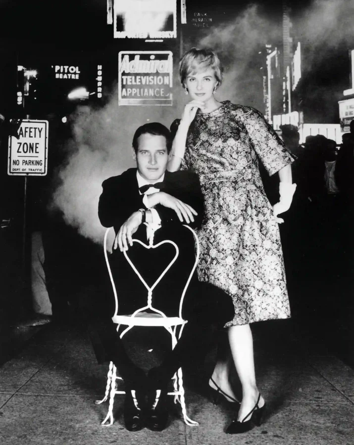 Paul Newman Joanne Woodward Times Square poster showing a New York night portrait.