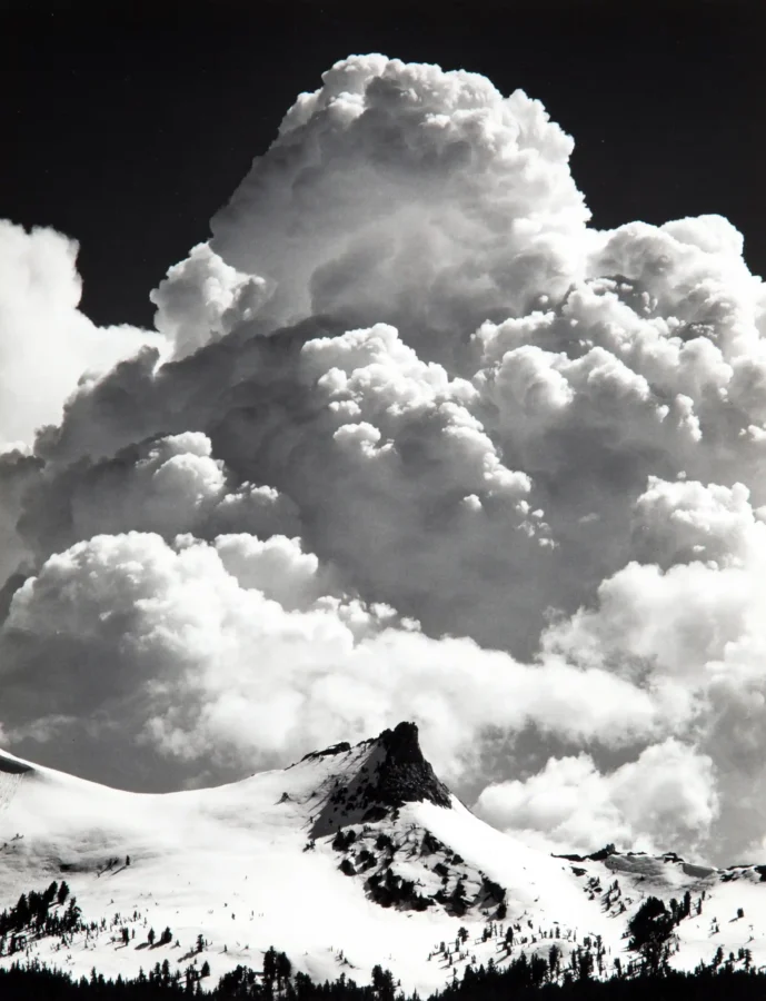 Ansel Adams poster showing Unicorn Peak and thunderclouds in Yosemite National Park.