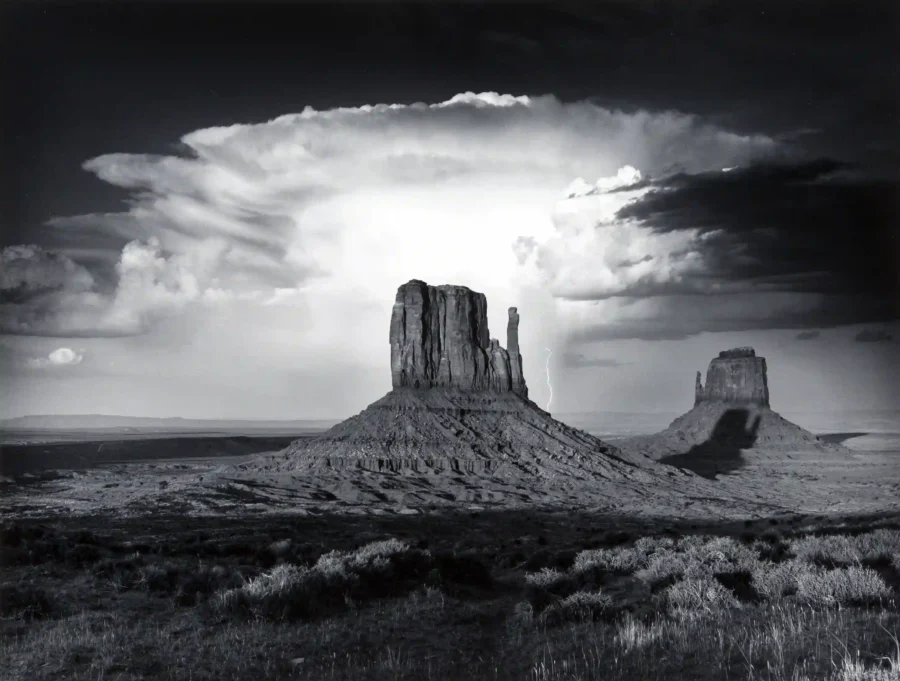 Anthony J Beckesh poster showing Monument Valley’s Mittens under thunderclouds.