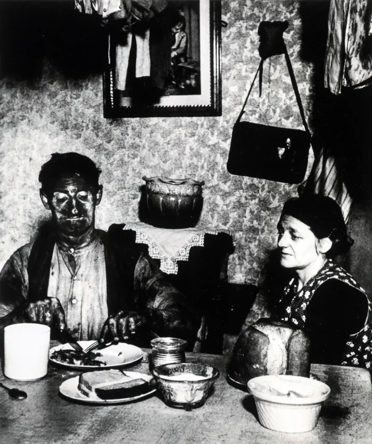 Bill Brandt poster showing a Northumbrian miner at his evening meal in 1937.