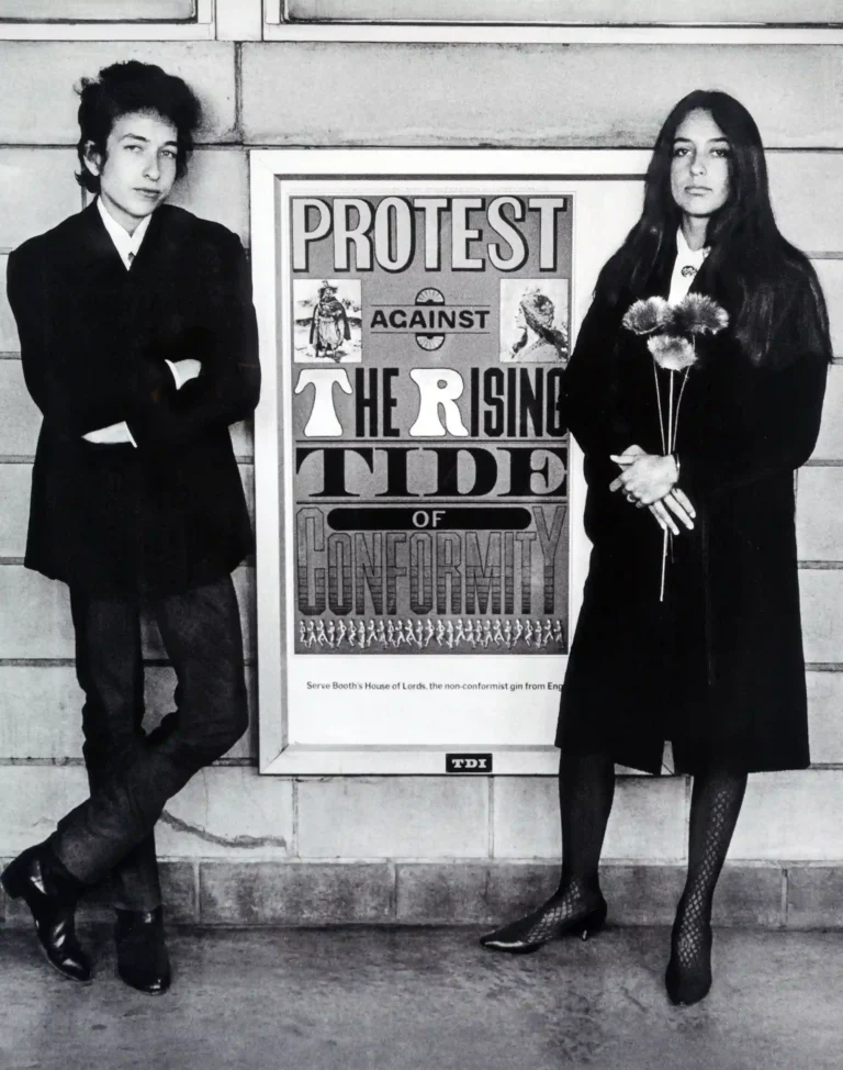 Daniel Kramer poster showing Bob Dylan and Joan Baez with a protest sign in Newark.