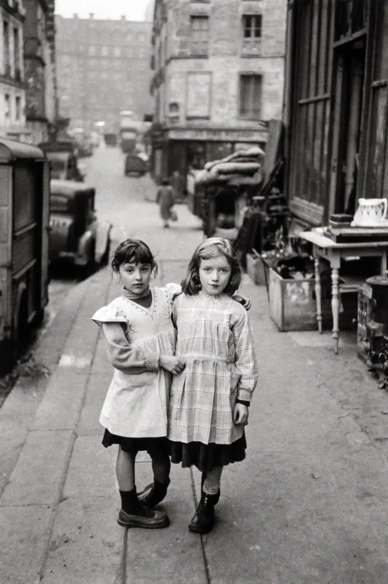 Clean artwork view of Deux Fillettes Photo Print, Édouard Boubat 1952 Poster. Deux Fillettes Photo Print (1952) connects Édouard Boubat with Édouard Boubat’s Deux Fillettes photograph from 1952 in a clean wall-print format.