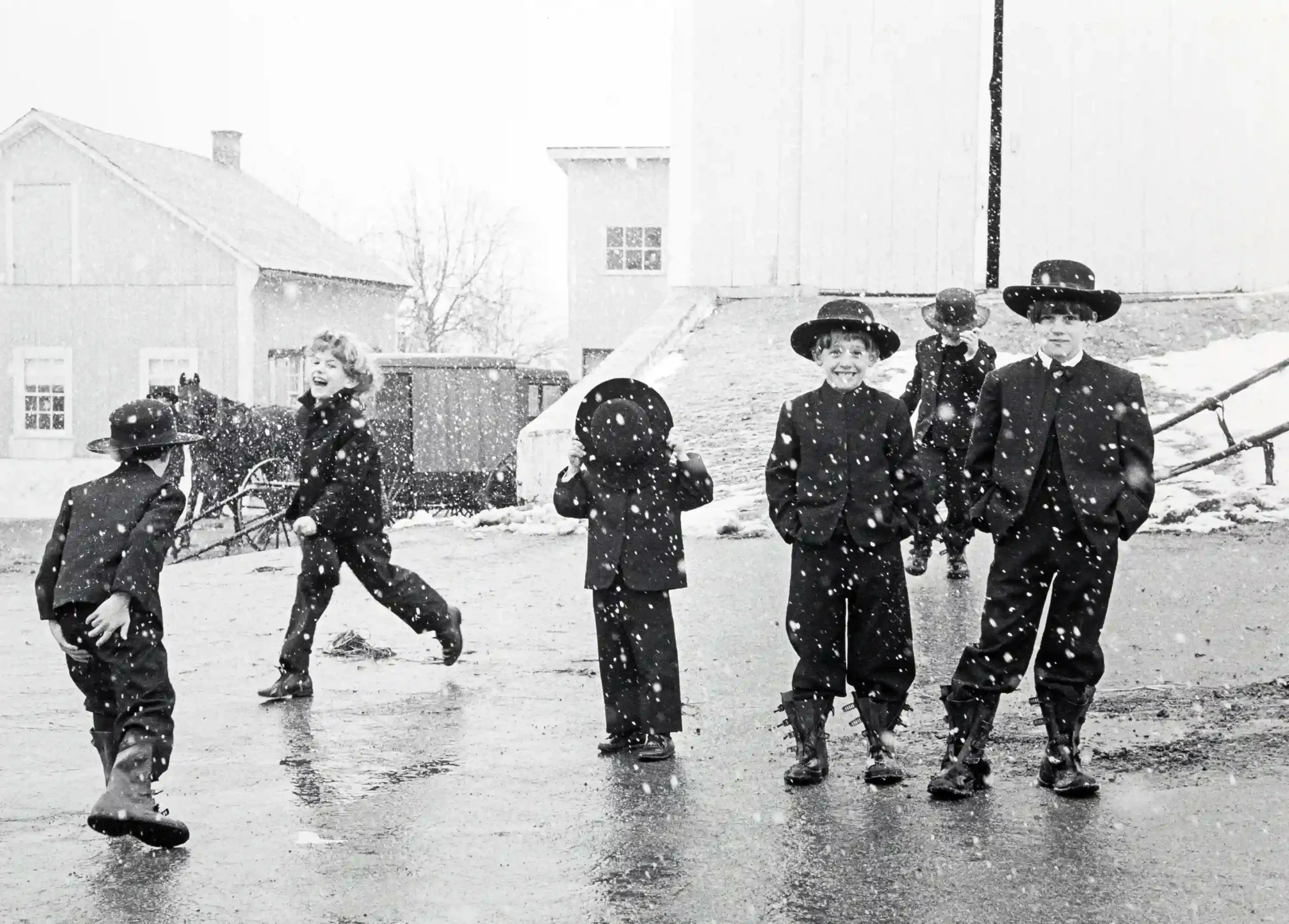George A. Tice poster showing Amish children playing in Lancaster snow.
