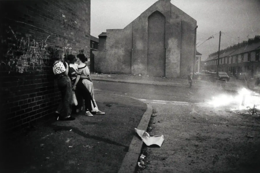 Gilles Peress poster showing a summer evening in Woodvale, Belfast during 1989.