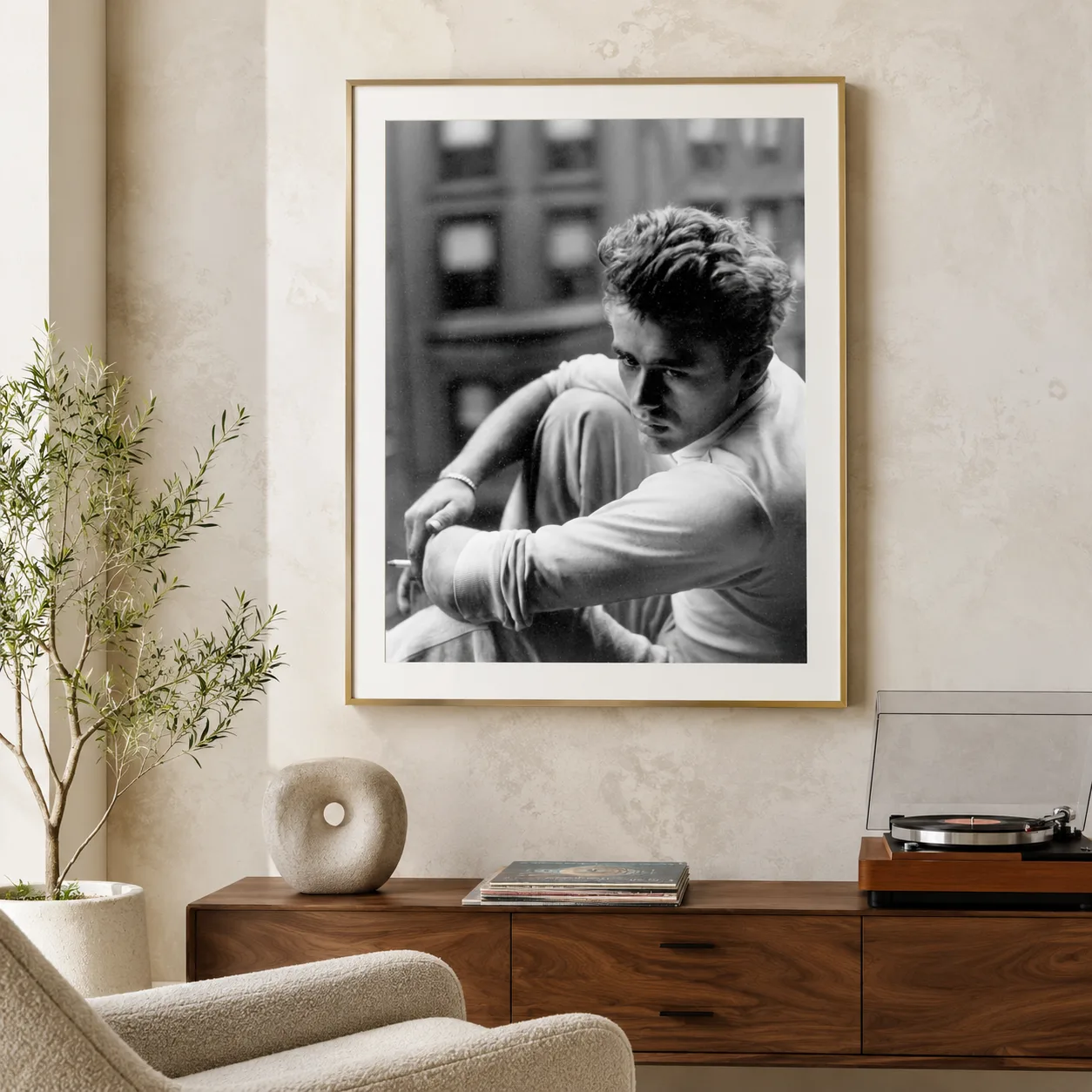 James Dean Nyc Apartment — james Dean sits on a New York apartment ledge with one knee raised and
