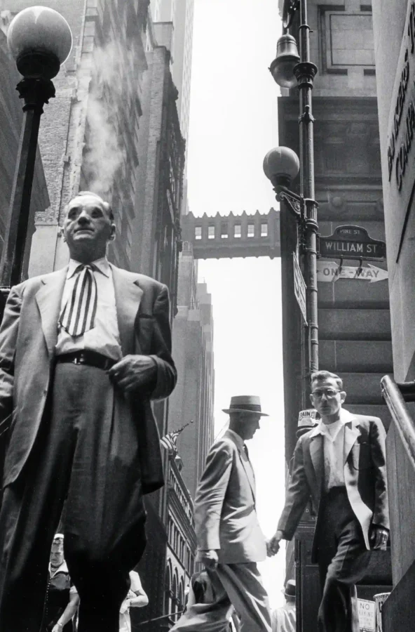 Leonard Freed poster showing Wall Street photographed in 1954 with city pressure and movement.