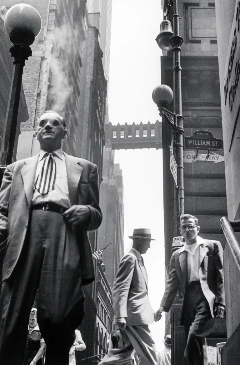 Leonard Freed poster showing Wall Street photographed in 1954 with city pressure and movement.