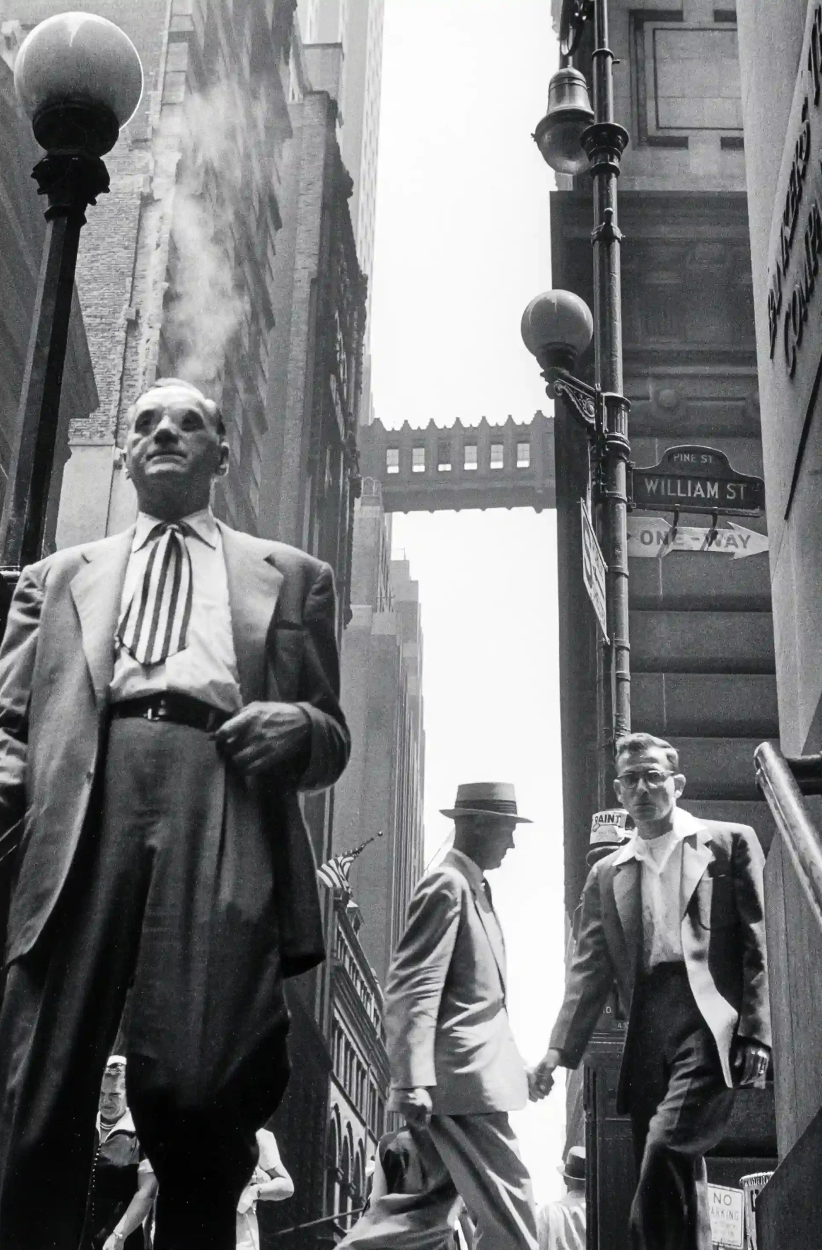 Leonard Freed poster showing Wall Street photographed in 1954 with city pressure and movement.
