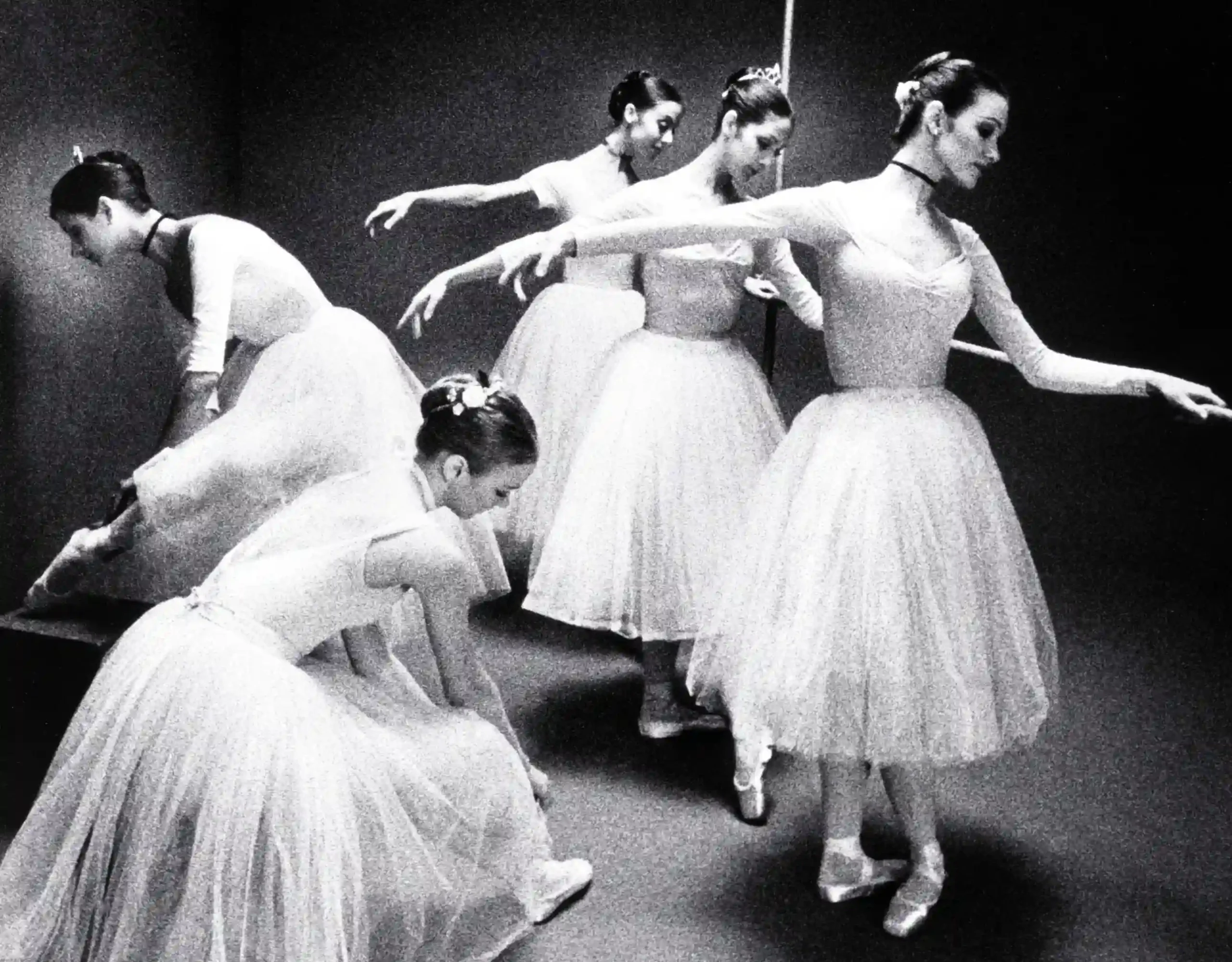 Max Waldman poster showing a ballet rehearsal scene with dancers held in stage light.