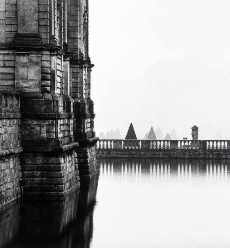 Clean artwork view of Michael Kenna Mist and Moat Vaux Le Vicomte France Photography Print. Mist Moat Vaux Photography Print presents Mist and Moat Vaux Le Vicomte France 1988 by Michael Kenna, a black-and-white image from 1988 shaped by clear.