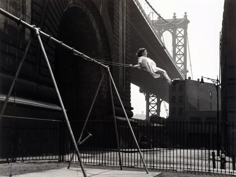 Walter Rosenblum poster showing a young girl on a city swing in 1938 New York.