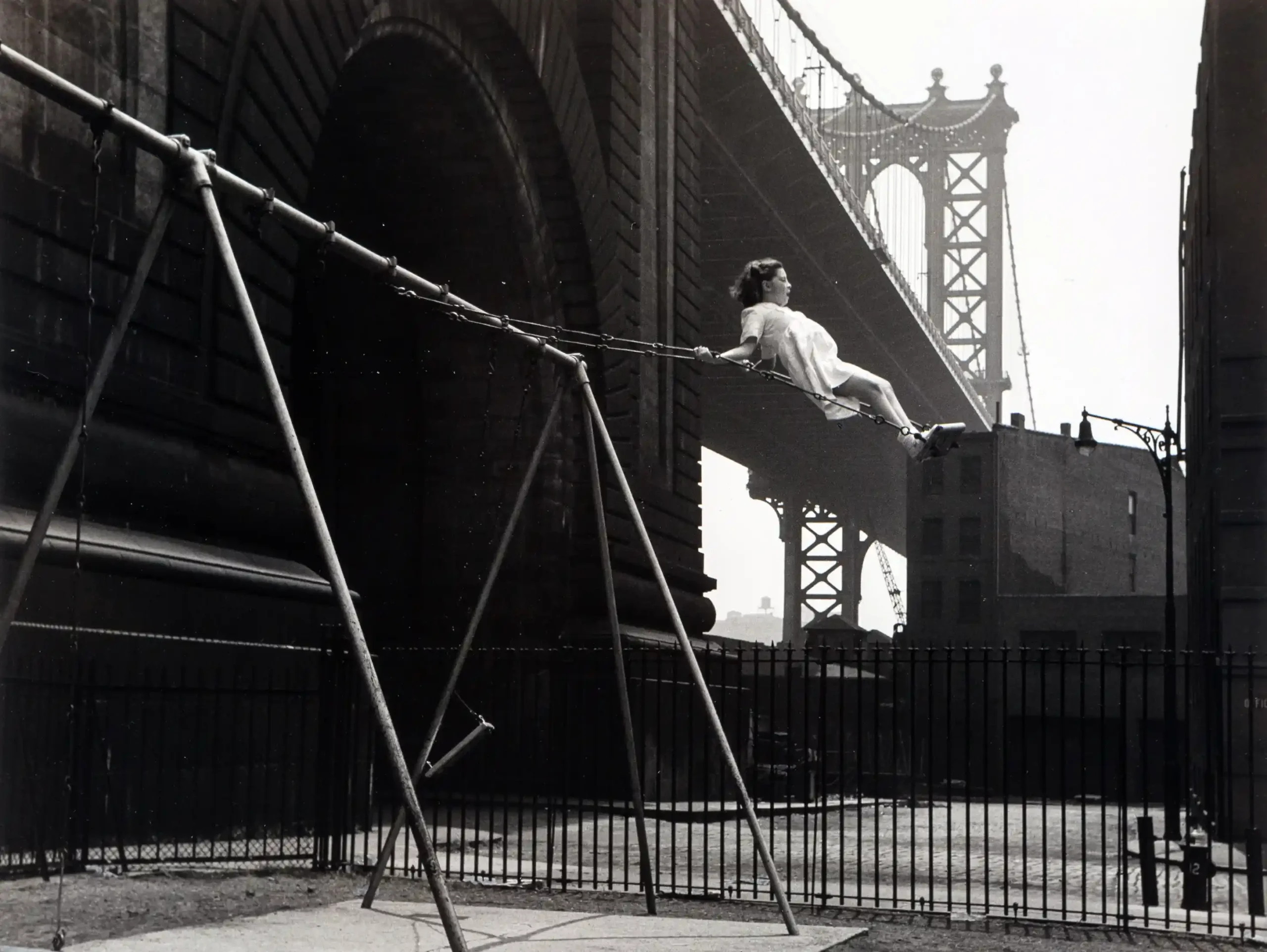 Walter Rosenblum poster showing a young girl on a city swing in 1938 New York.