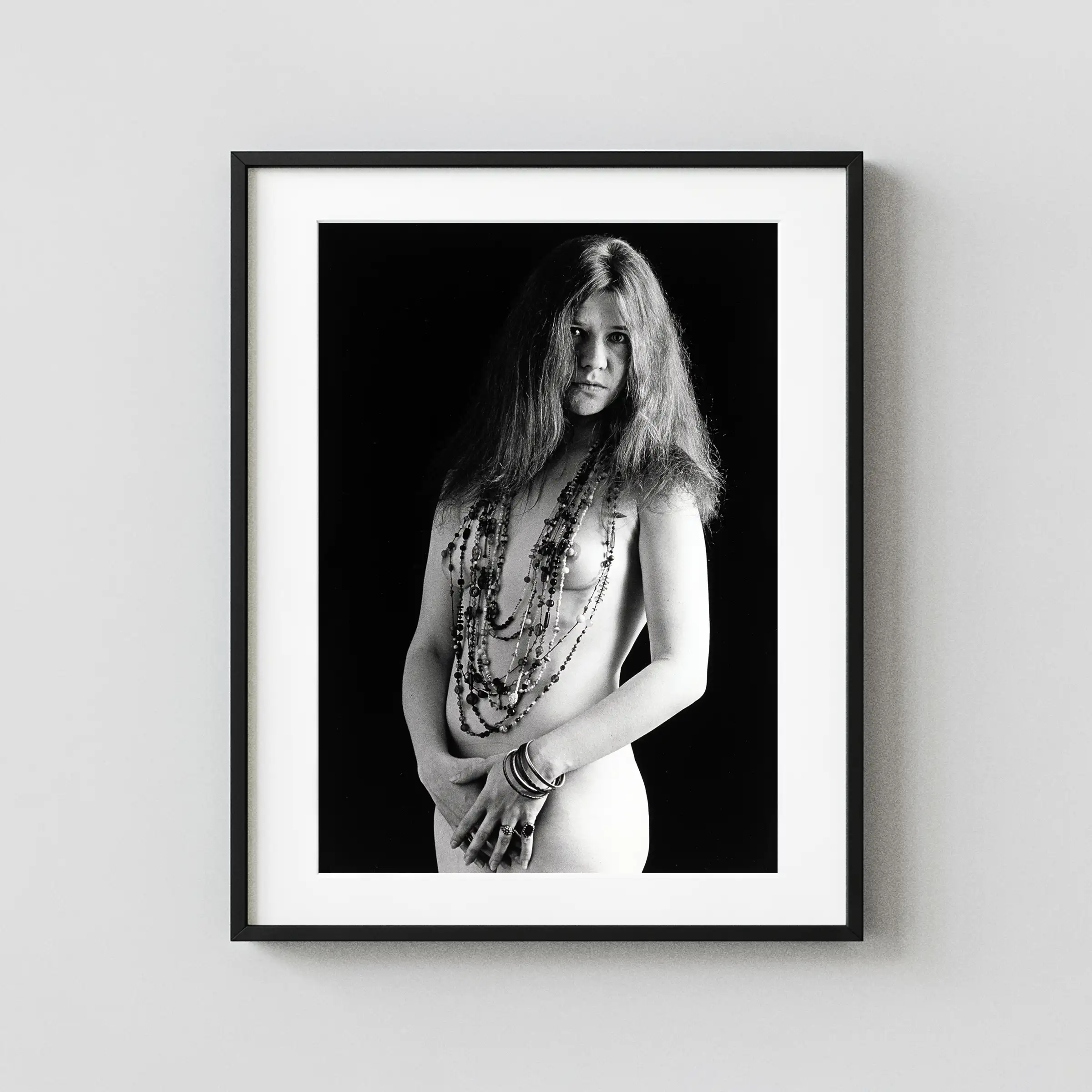 Janis Joplin 1967 Nude displayed as a framed wall mockup