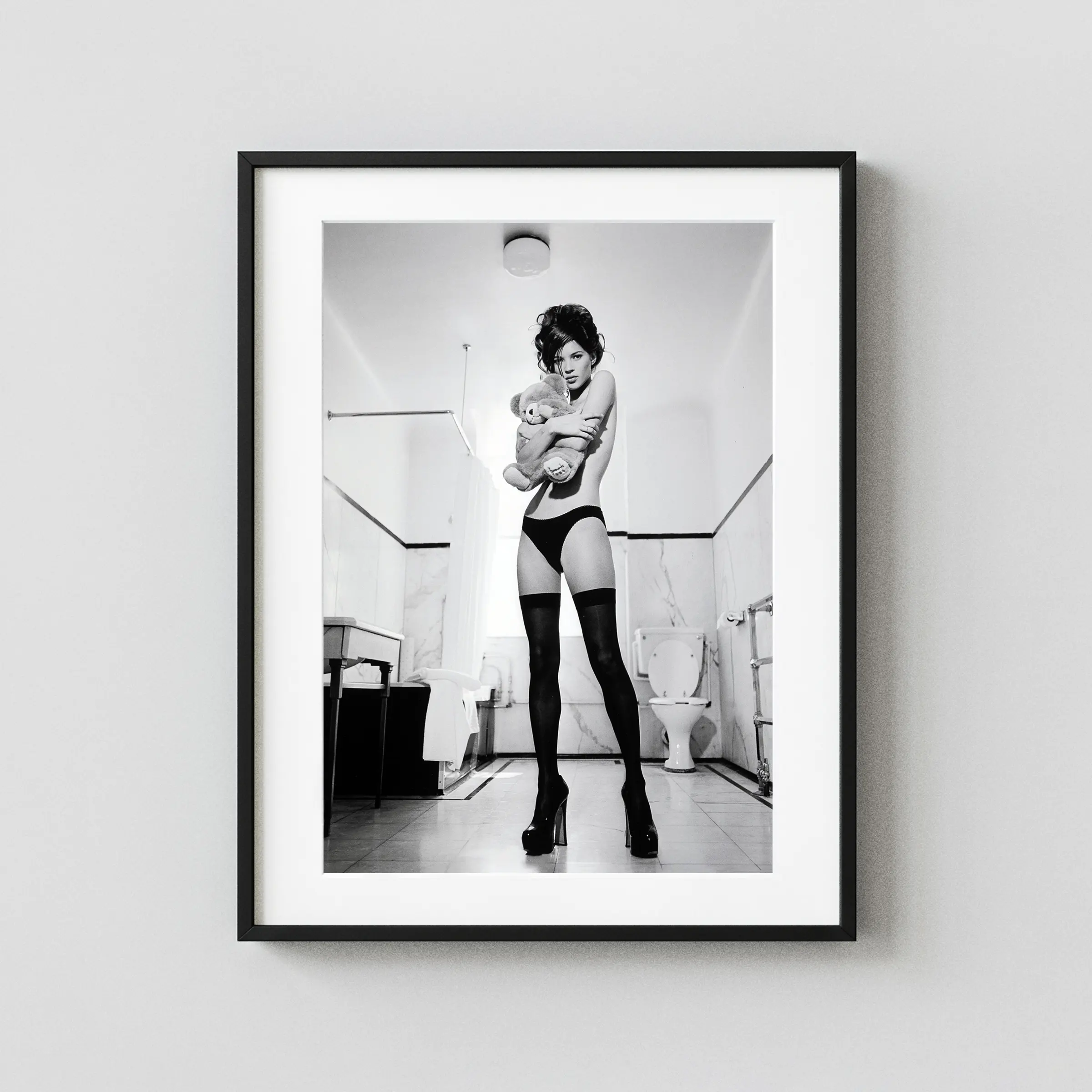 Kate Moss With Teddy Bear II 1991 Nude displayed as a framed wall mockup
