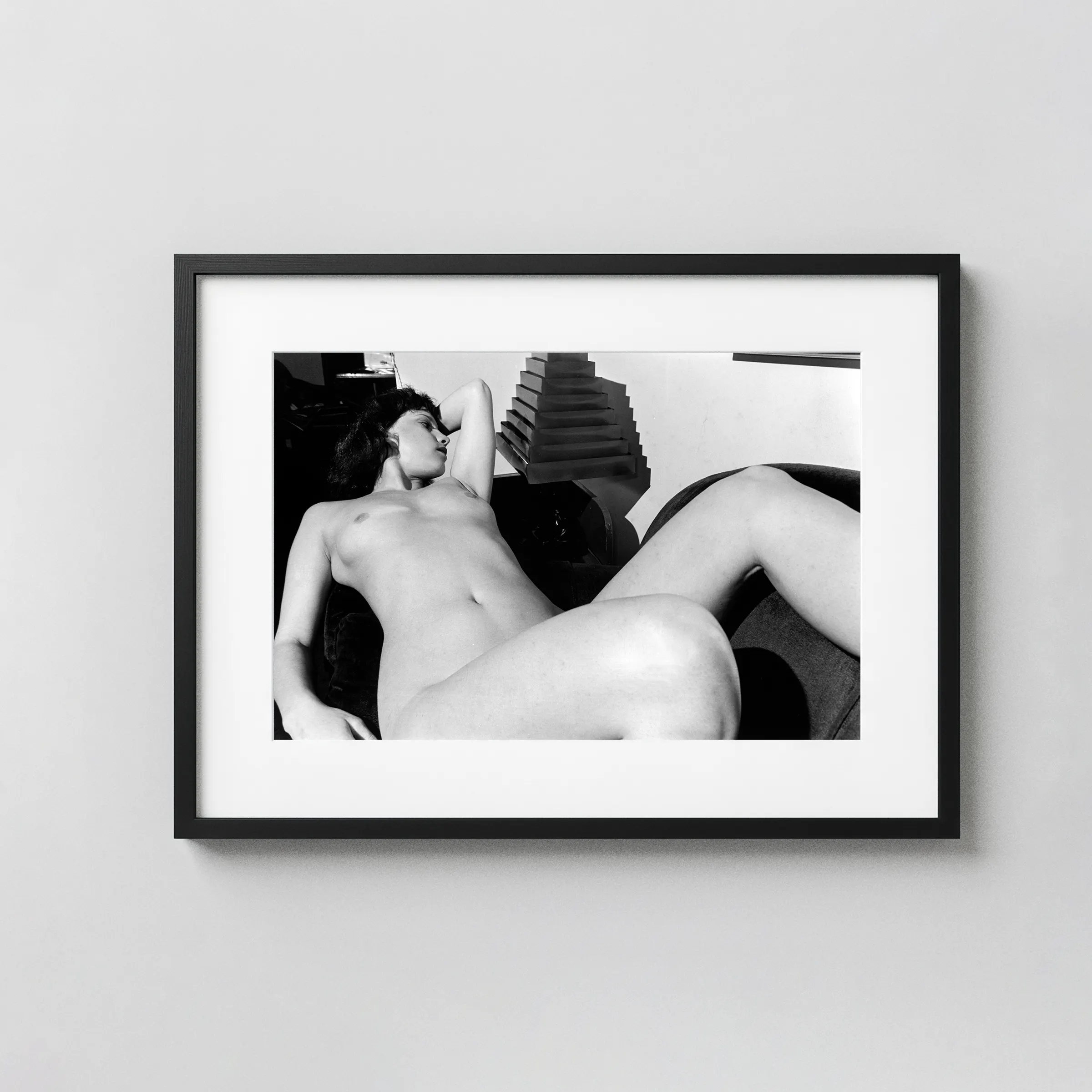 Reclining Nude with Geometric Forms 1982 displayed as a framed wall mockup