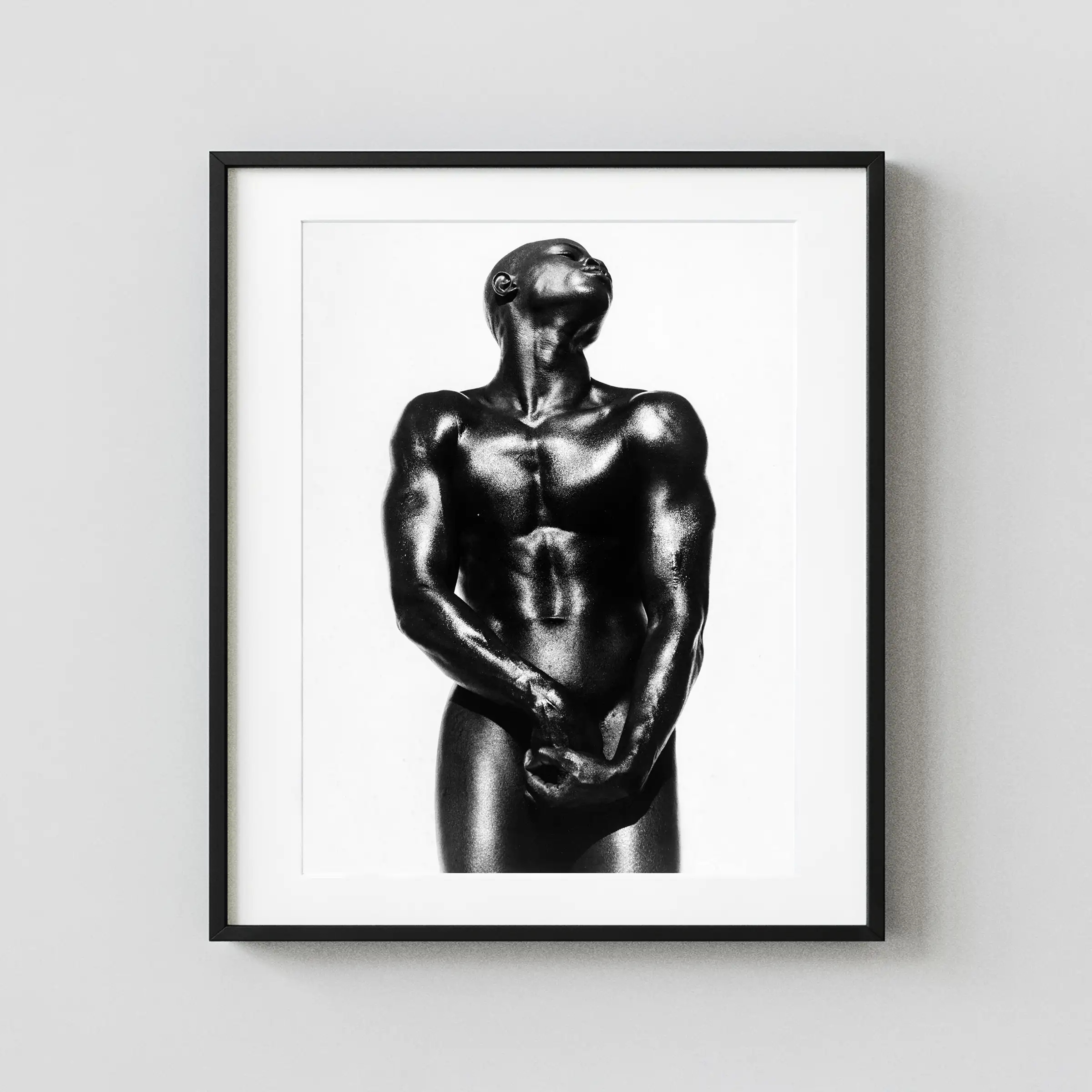 High-Contrast Male Nude 1989 displayed as a framed wall mockup