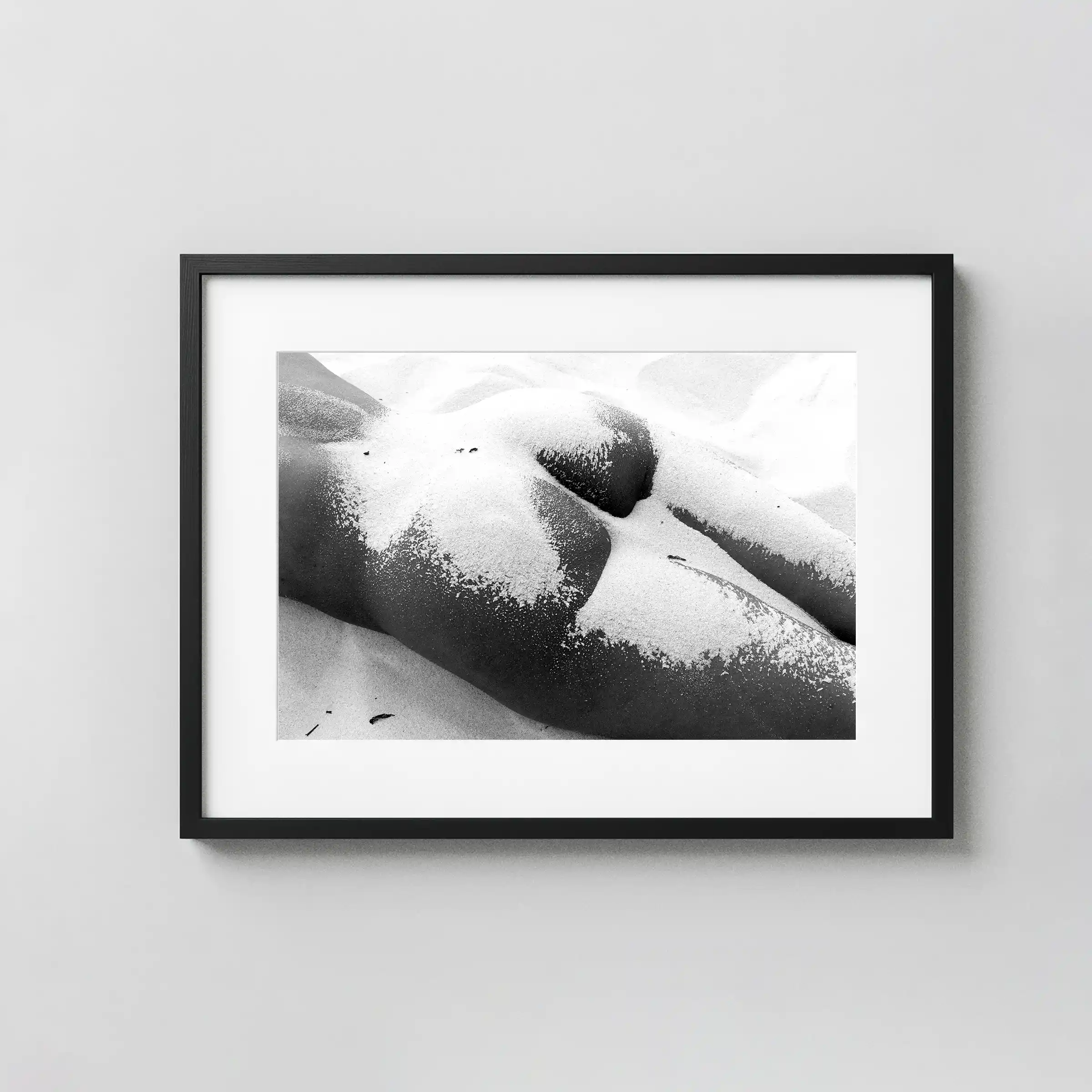 Nude In The Sands 1982 displayed as a framed wall mockup