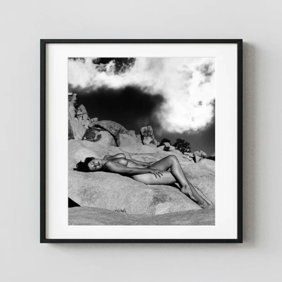 Nude Laying On Rocks Circa 1960 displayed as a framed wall mockup