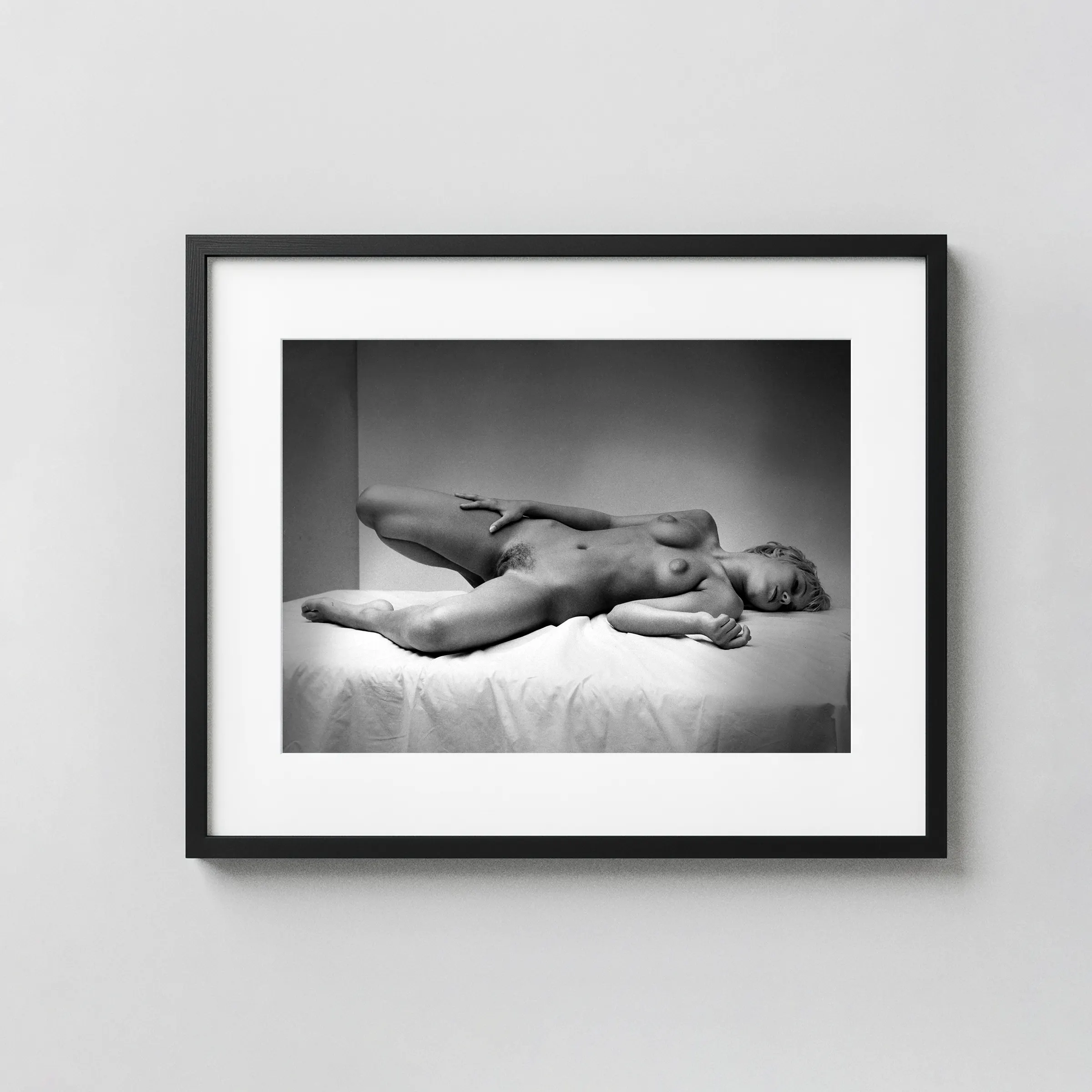 Nude On Bed 1960 displayed as a framed wall mockup