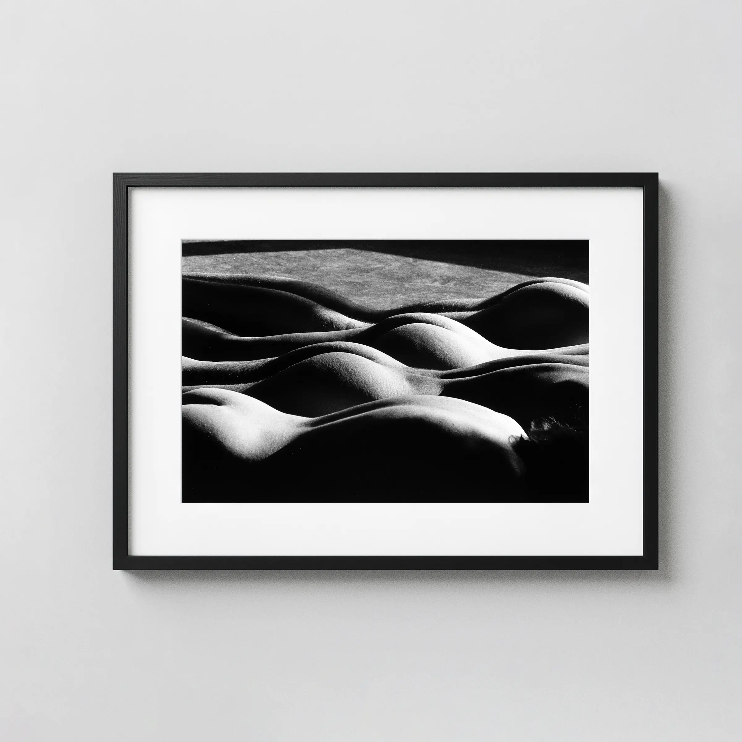 Layered Nudes in Shadow 1985 displayed as a framed wall mockup