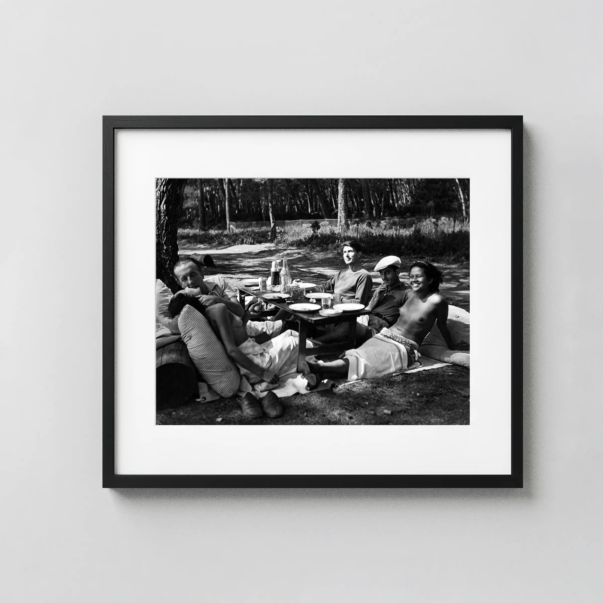 Surrealist Picnic with Nusch Éluard and Man Ray 1937 Nude displayed as a framed wall mockup