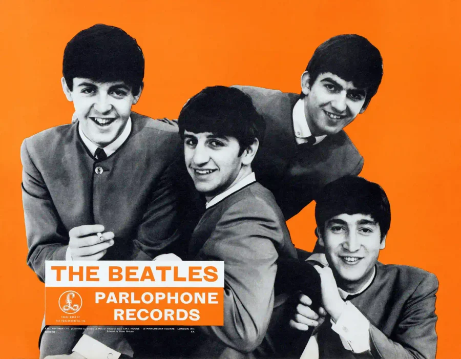 The Beatles 1963 EMI, Parlophone British Promotional Poster featuring white, black, and orange vertical artwork.