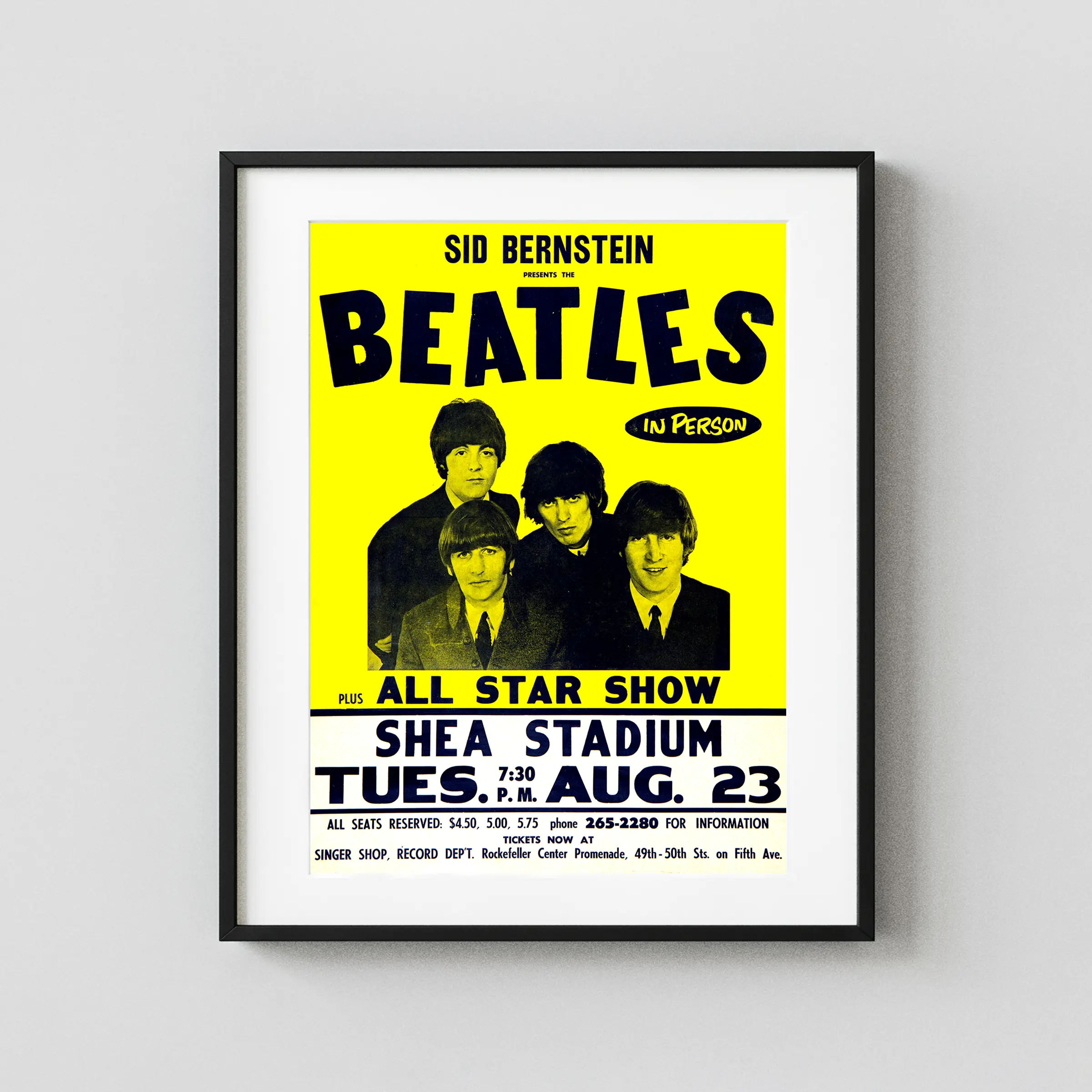 The Beatles 1966 Shea Stadium NY Concert Poster featuring yellow, white, and black vertical artwork.