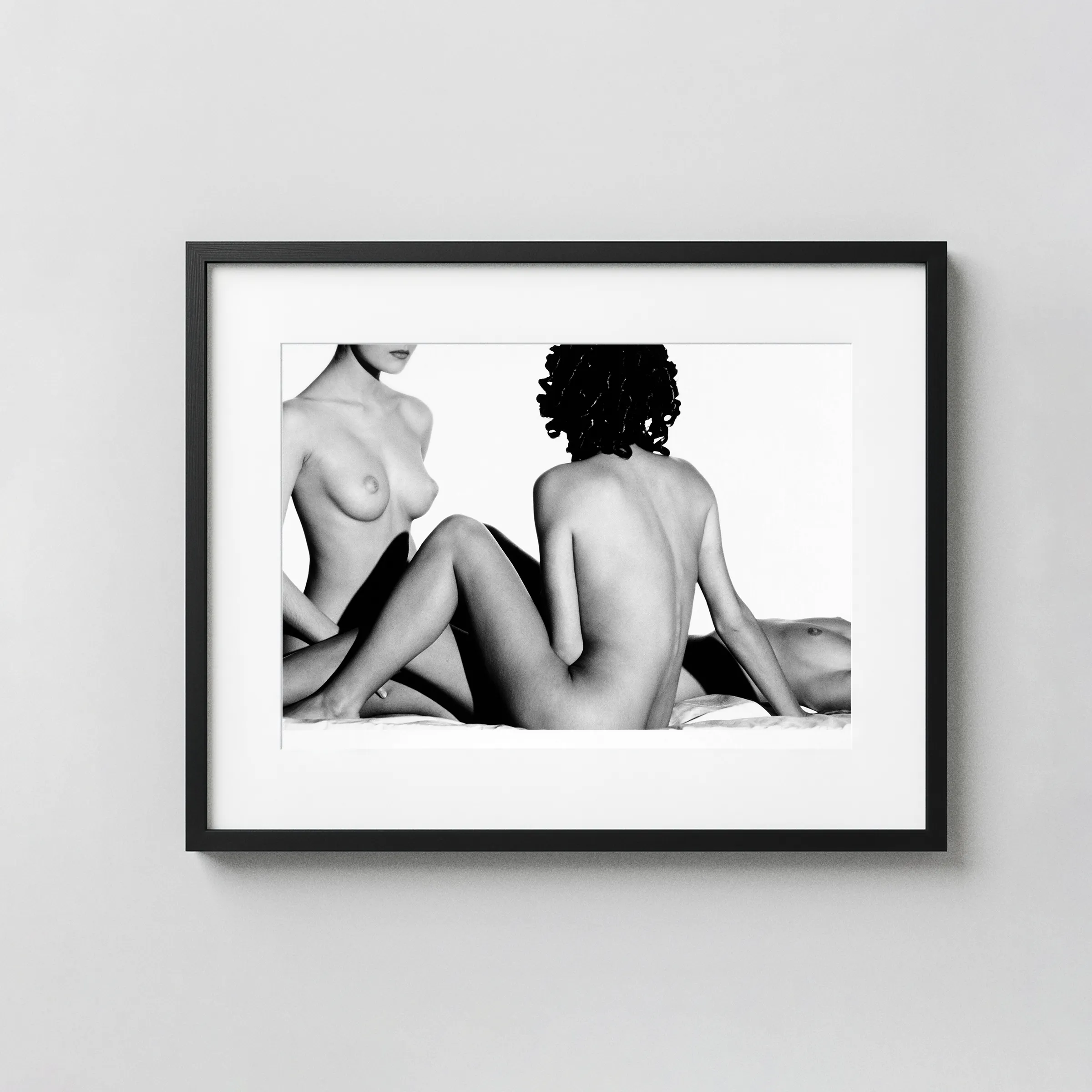 Three Nudes 1984 displayed as a framed wall mockup