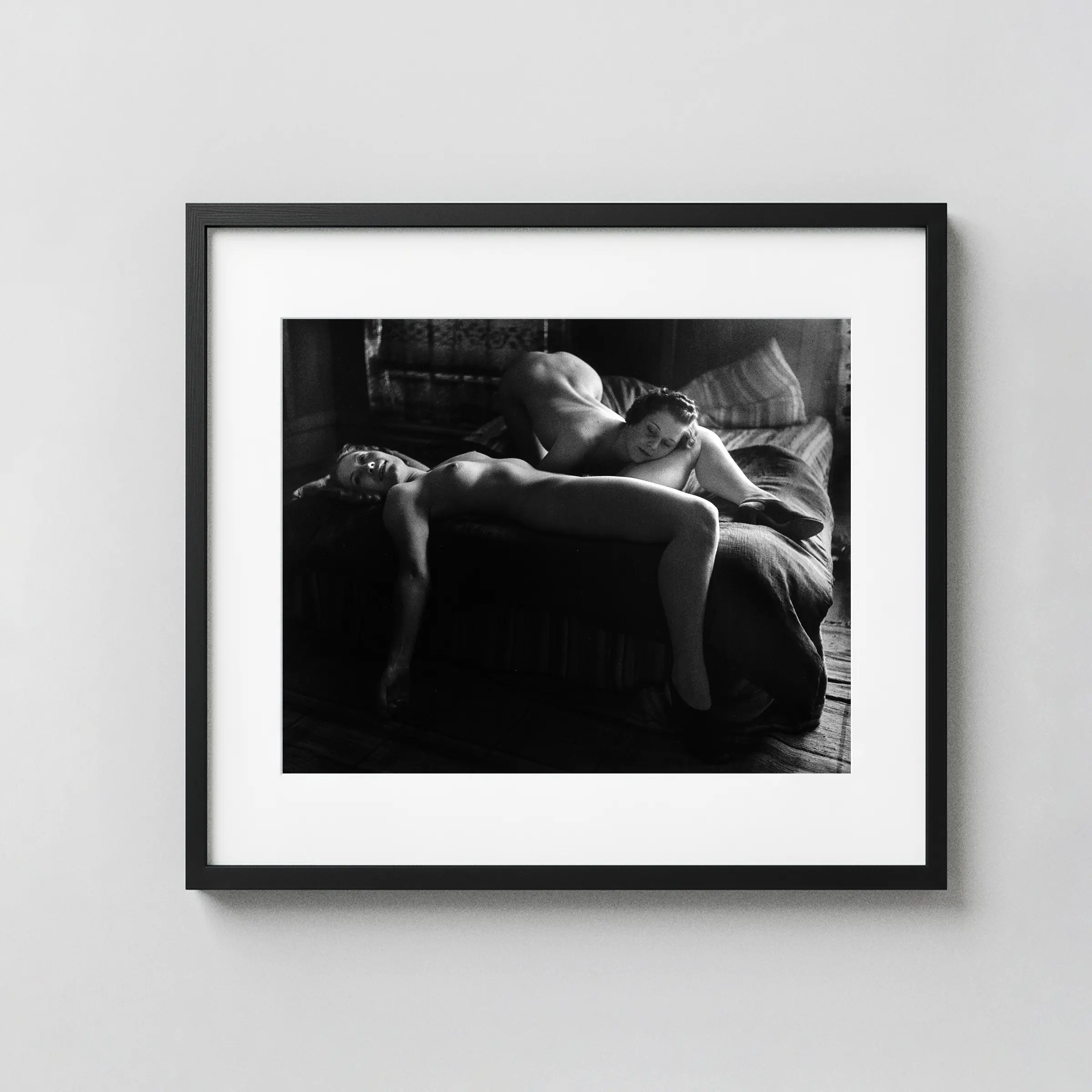 Two Nudes Attracted 1937 displayed as a framed wall mockup