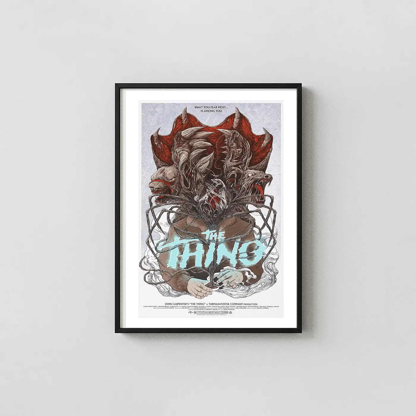 John Carpenter'S The Thing Mondo Poster By Randy Ortiz | Cult Horror Movie Art Print John Carpenter'S The Thing Mondo Poster By Randy Ortiz | Cult Horror Movie Horror Movies Posters Xe2X80X93 Portrait Frame Wall Art Mockup | Merchfuse